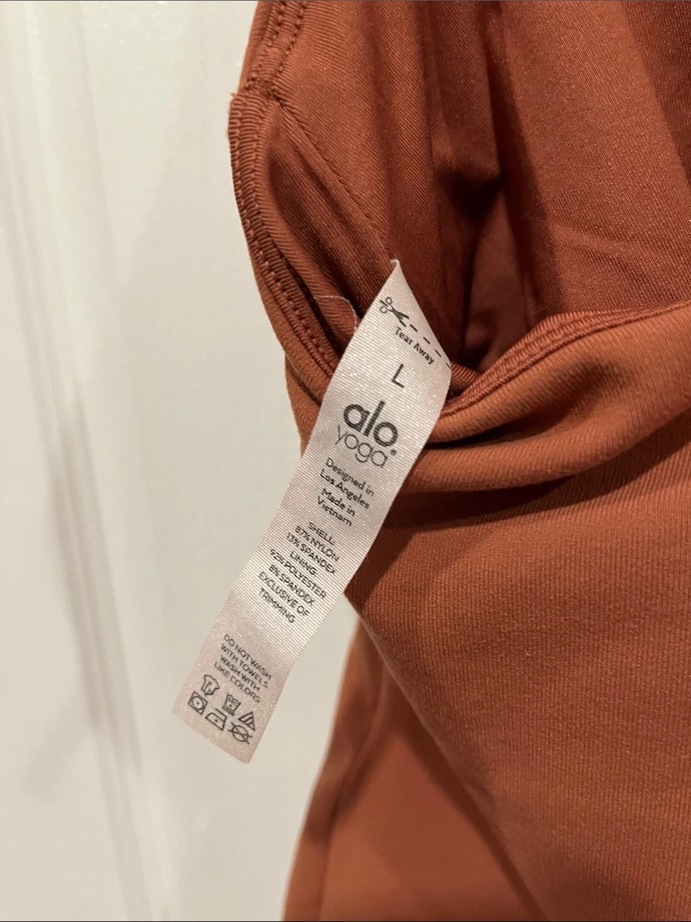 ALO Yoga *Rust* SleekBack Bodysuit size L